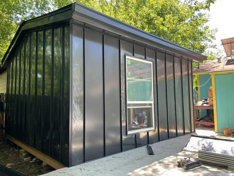 Black standing seam metal wall panels for Roof Inspection in Perrysburg