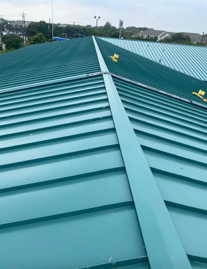 Green commercial metal roof ridge and valley for Metal Roof Repair in Perrysburg